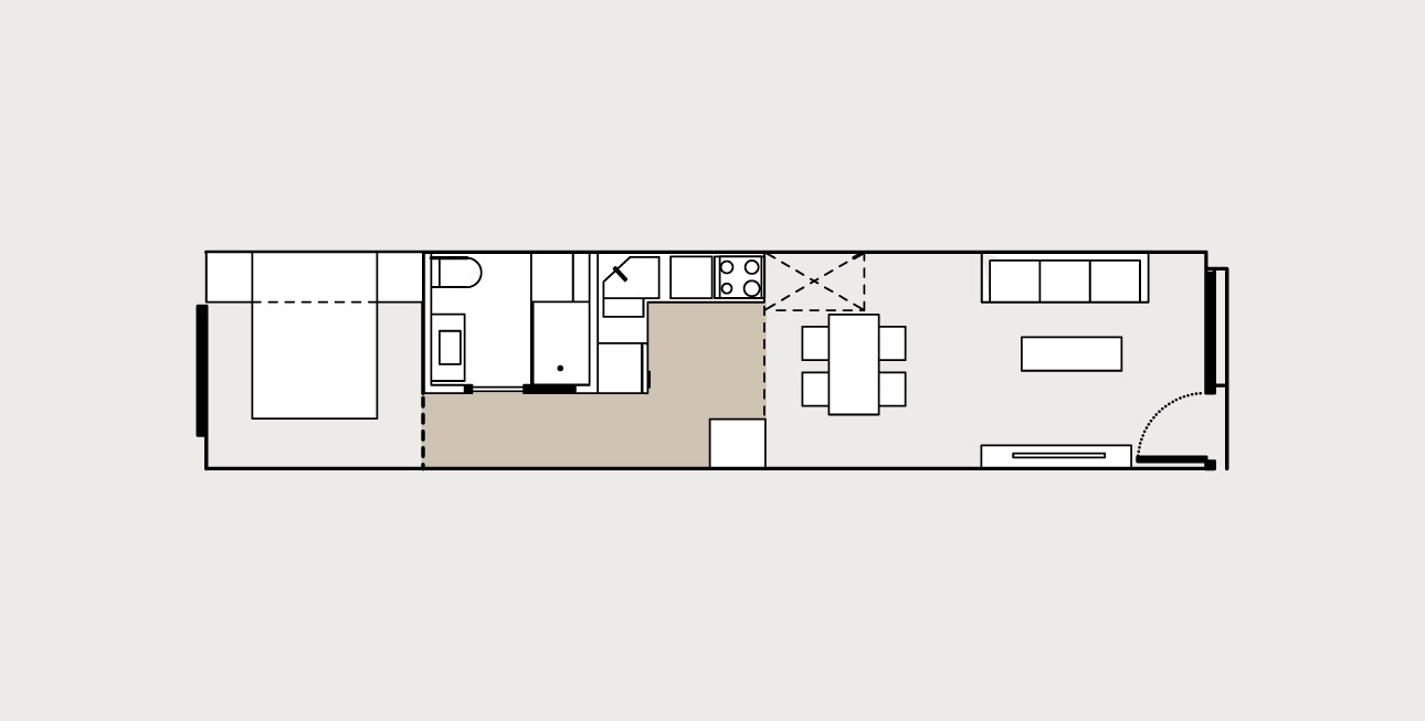 Floor plan of the one-bedroom apartment: bedroom, bathroom, galley kitchen, living and dining room.